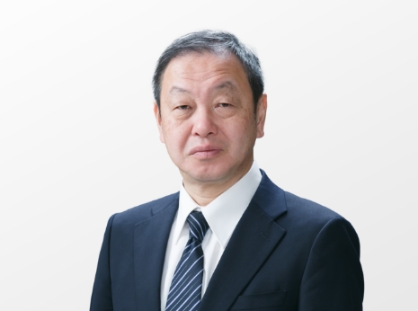 Portrait photo of NGK FINE MOLDS, INC. CEO Tetsuya Motobayashi.